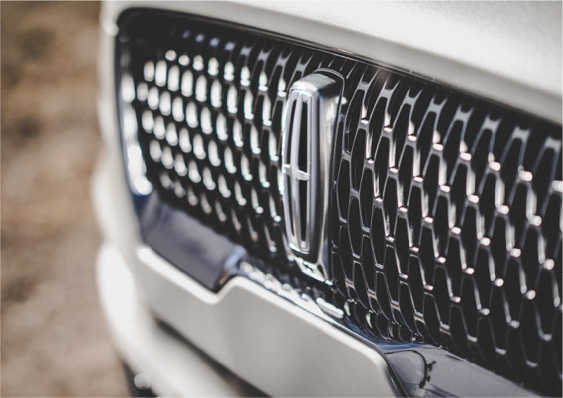 The grille of the 2023 Lincoln Aviator® Reserve model with an eye-catching repeated field of Lincoln Star logo shapes | Kirk Brothers Lincoln of Vicksburg in Vicksburg MS