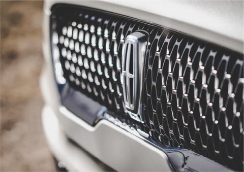 The grille of the 2023 Lincoln Aviator® Reserve model with an eye-catching repeated field of Lincoln Star logo shapes | Kirk Brothers Lincoln of Vicksburg in Vicksburg MS