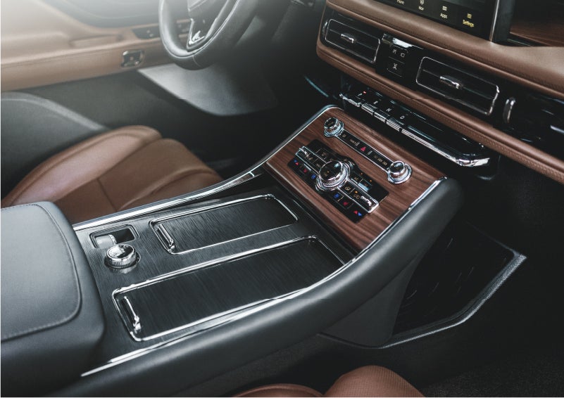 The front center console of a 2023 Lincoln Aviator® SUV is shown in | Kirk Brothers Lincoln of Vicksburg in Vicksburg MS