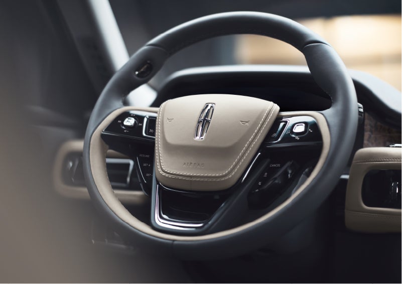 The intuitively placed controls of the steering wheel on a 2023 Lincoln Aviator® SUV | Kirk Brothers Lincoln of Vicksburg in Vicksburg MS