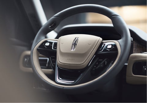 The intuitively placed controls of the steering wheel on a 2023 Lincoln Aviator® SUV | Kirk Brothers Lincoln of Vicksburg in Vicksburg MS