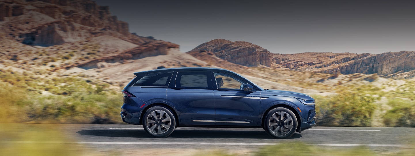 A 2024 Lincoln Nautilus® SUV is being driven in a desert setting. | Kirk Brothers Lincoln of Vicksburg in Vicksburg MS