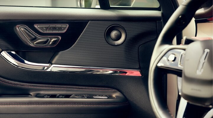 A Revel® audio speaker is shown in the driver's side door of a 2025 Lincoln Corsair® SUV. | Kirk Brothers Lincoln of Vicksburg in Vicksburg MS
