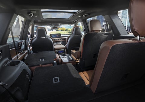 One side of the PowerFold® third-row seat and a second-row seat are folded forward in the 2026 Lincoln Aviator® SUV. | Kirk Brothers Lincoln of Vicksburg in Vicksburg MS
