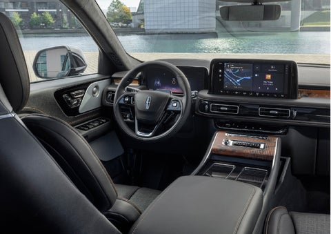 The interior of the 2026 Lincoln Aviator® SUV is shown parked with a view of a harbor through the windshield. | Kirk Brothers Lincoln of Vicksburg in Vicksburg MS