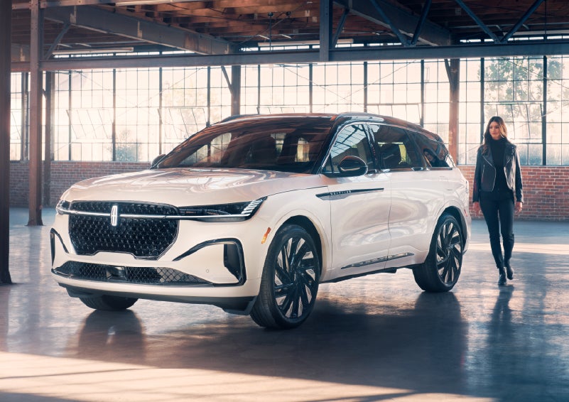 A person approaches a 2026 Lincoln Nautilus® SUV. | Kirk Brothers Lincoln of Vicksburg in Vicksburg MS