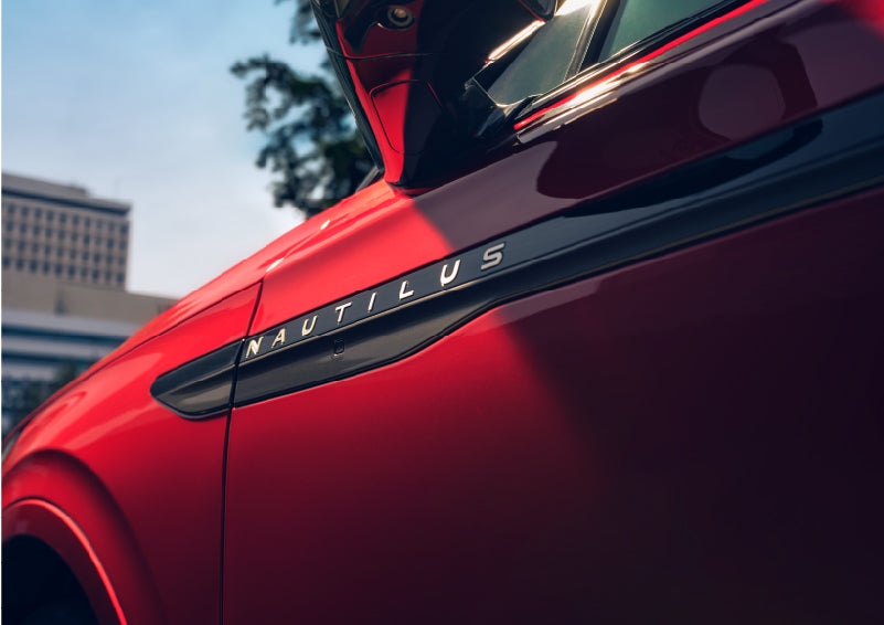A side badge on the passenger door reads Nautilus. | Kirk Brothers Lincoln of Vicksburg in Vicksburg MS