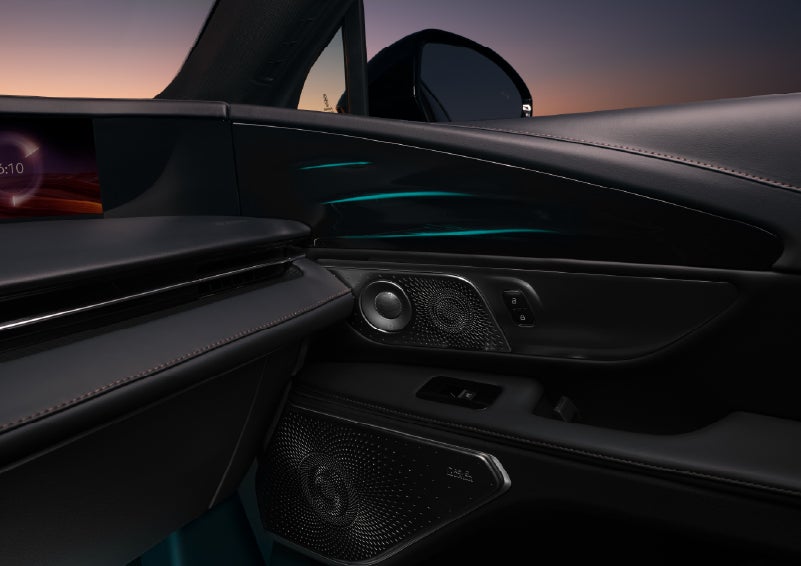 Selectable ambient lighting glows in the passenger door panel. | Kirk Brothers Lincoln of Vicksburg in Vicksburg MS